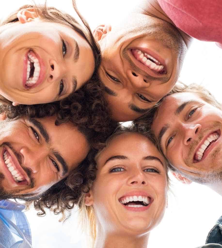 Smiling person showcasing white teeth after laser whitening treatment Loughborough